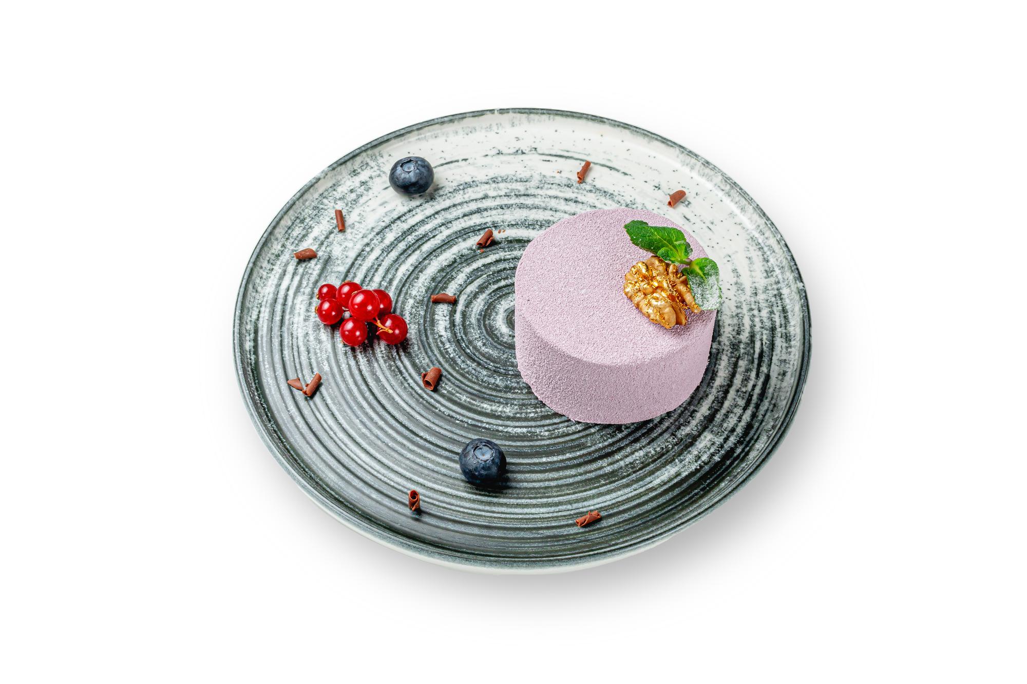 Close detail: plated dessert with geometric garnish