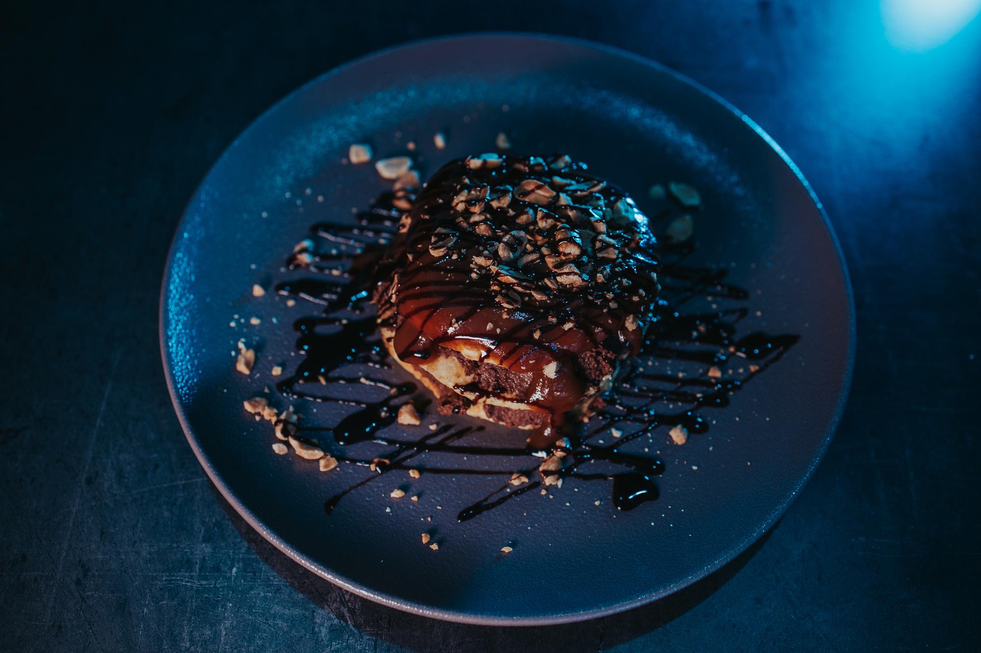 Close-up of plated modern dish with molecular garnish
